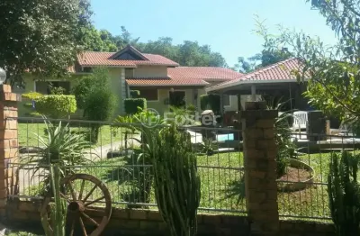 Casa com 4 quartos à venda na rua olmiro lametta viegas, 6, hípica, porto alegre, 260 m2 por r$ 950.000