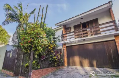 Casa com 4 quartos à venda na avenida panamericana, 940, jardim lindóia, porto alegre, 303 m2 por r$ 1.850.000