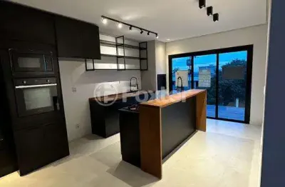 Casa em condomínio fechado com 3 quartos à venda na rua antônio baggio, 40, loteamento jardim timbaúva, gravataí, 158 m2 por r$ 990.000