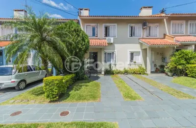 Casa em condomínio fechado com 2 quartos à venda na avenida joão salomoni, 131, vila nova, porto alegre, 126 m2 por r$ 440.000