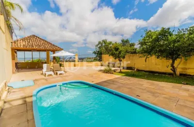 Casa com 4 quartos à venda na rua alcebíades antônio dos santos, 379, nonoai, porto alegre, 375 m2 por r$ 1.805.000