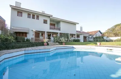 Casa com 5 quartos à venda na rua caiapó, 15, vila assunção, porto alegre, 508 m2 por r$ 2.470.000