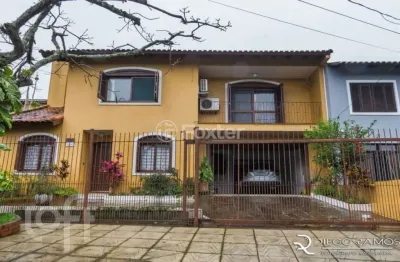 Casa com 6 quartos à venda na rua andré primo biazetto, 6, campo novo, porto alegre, 330 m2 por r$ 1.100.000