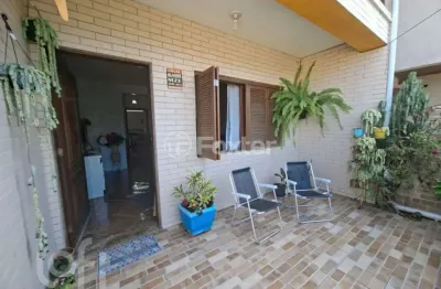 Casa com 4 quartos à venda na Rua Raffaele Nigro, 65, Hípica, Porto Alegre, 220 m2 por R$ 535.000
