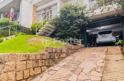 Casa com 3 quartos à venda na rua gustavo schmidt, 332, três figueiras, porto alegre, 227 m2 por r$ 1.275.000