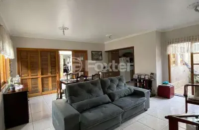 Casa com 3 quartos à venda na rua mário totta, 501, americana, alvorada, 110 m2 por r$ 650.000