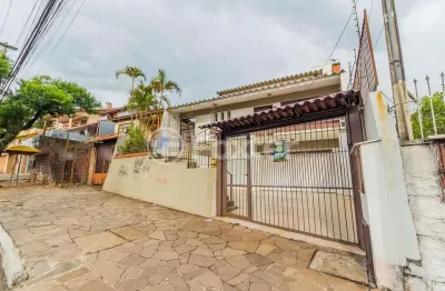 Casa com 5 quartos à venda na avenida nonoai, 1686, nonoai, porto alegre, 358 m2 por r$ 800.000