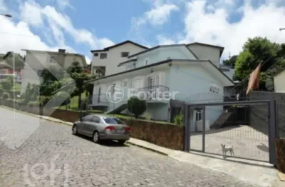 Casa com 4 quartos à venda na rua carlos ceroni, 65, rio branco, caxias do sul, 280 m2 por r$ 1.800.000