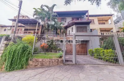 Casa com 6 quartos à venda na rua fernando abbott, 1055, cristo redentor, porto alegre, 431 m2 por r$ 1.300.000