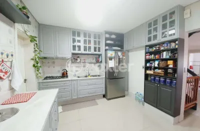 Casa em condomínio fechado com 3 quartos à venda na avenida juca batista, 8000, chapéu do sol, porto alegre, 217 m2 por r$ 1.280.000