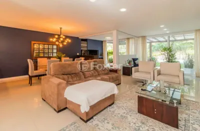 Casa em condomínio fechado com 4 quartos à venda na avenida juca batista, 8000, chapéu do sol, porto alegre, 297 m2 por r$ 1.850.000