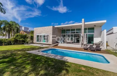 Casa em condomínio fechado com 4 quartos à venda na avenida juca batista, 8000, chapéu do sol, porto alegre, 421 m2 por r$ 3.200.000