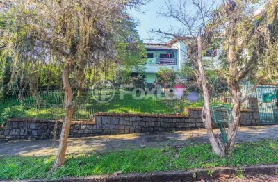 Casa com 5 quartos à venda na rua doutor possidônio cunha, 62, vila assunção, porto alegre, 430 m2 por r$ 2.120.000