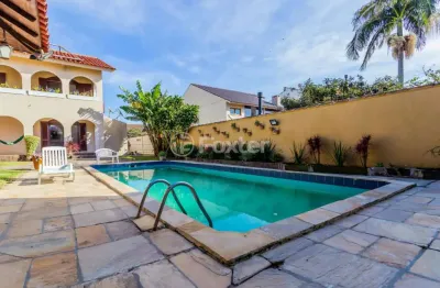 Casa com 6 quartos à venda na rua paulo blaschke, 670, jardim itu sabará, porto alegre, 546 m2 por r$ 1.650.000
