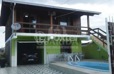 Casa com 2 quartos à venda na rua ênio de souza, 39, vila nova, porto alegre, 120 m2 por r$ 373.000