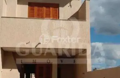 Casa com 2 quartos à venda na rua heitor kramer, 640, guarujá, porto alegre, 124 m2 por r$ 430.000
