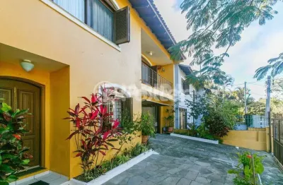 Casa com 3 quartos à venda na rua andré primo biazetto, 414, campo novo, porto alegre, 330 m2 por r$ 1.100.000