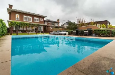 Casa em condomínio fechado com 4 quartos à venda na avenida juca batista, 9000, belém novo, porto alegre, 330 m2 por r$ 2.862.000
