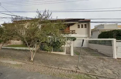 Casa com 3 quartos à venda na rua professor abílio azambuja, 675, jardim do salso, porto alegre, 308 m2 por r$ 812.250