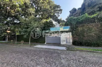 Casa com 4 quartos à venda na rua doutor possidônio cunha, 138, vila assunção, porto alegre, 500 m2 por r$ 4.500.000