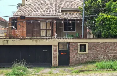 Casa com 3 quartos à venda na avenida deputado aramy silva, 277, santa tereza, porto alegre, 154 m2 por r$ 945.000