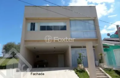 Casa em condomínio fechado com 4 quartos à venda na rua arahy borges ortiz, 30, mário quintana, porto alegre, 204 m2 por r$ 750.000