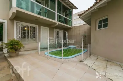 Casa com 3 quartos à venda na rua doutor álvaro sérgio masera, 61, medianeira, porto alegre, 188 m2 por r$ 690.000