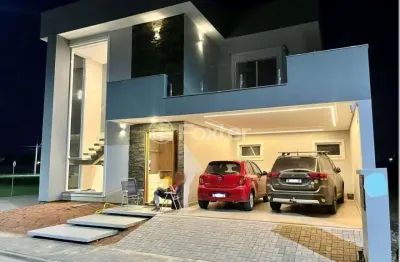 Casa em condomínio fechado com 3 quartos à venda na rua frederico warstat, 695, sans souci, eldorado do sul, 234 m2 por r$ 1.400.000