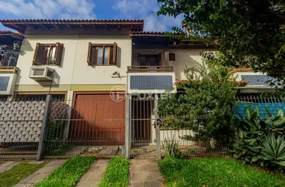 Casa em condomínio fechado com 3 quartos à venda na rua itapitocaí, 1031, cristal, porto alegre, 105 m2 por r$ 430.000