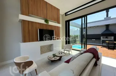 Casa em condomínio fechado com 4 quartos à venda na rua honorio ferreira da silva, 2009, arco íris, capão da canoa, 185 m2 por r$ 1.770.000