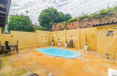 Casa com 3 quartos à venda na rua lloyd de andrade polidoro, 55, ipanema, porto alegre, 239 m2 por r$ 767.125
