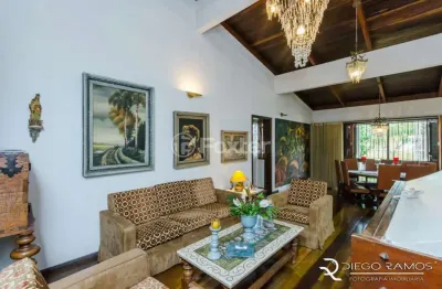 Casa com 4 quartos à venda na rua professor guerreiro lima, 746, partenon, porto alegre, 200 m2 por r$ 1.100.000