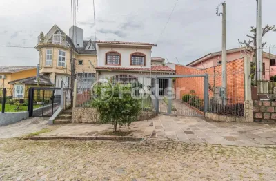 Casa com 4 quartos à venda na rua esteio, 220, cavalhada, porto alegre, 244 m2 por r$ 790.000