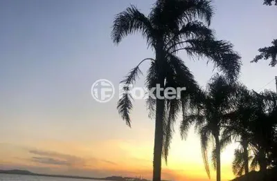 Terreno à venda na avenida guaíba, 10410, cristal, porto alegre, 1500 m2 por r$ 1.800.000