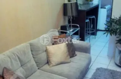 Casa em condomínio fechado com 2 quartos à venda na rua atílio supertti, 620, vila nova, porto alegre, 55 m2 por r$ 239.500
