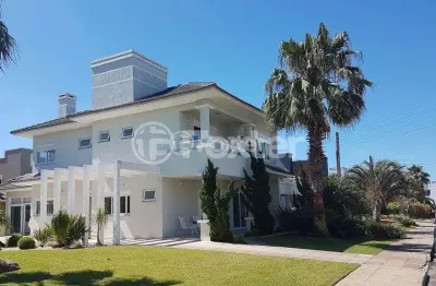 Casa em condomínio fechado com 6 quartos à venda na avenida central, 2000, zona nova, capão da canoa, 354 m2 por r$ 3.550.000