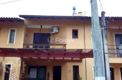 Casa em condomínio fechado com 2 quartos à venda na avenida edgar pires de castro, 1286, hípica, porto alegre, 66 m2 por r$ 350.000