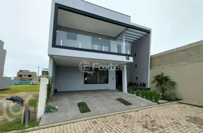 Casa em condomínio fechado com 3 quartos à venda na rua cairu, 444, rio branco, canoas, 193 m2 por r$ 1.800.000