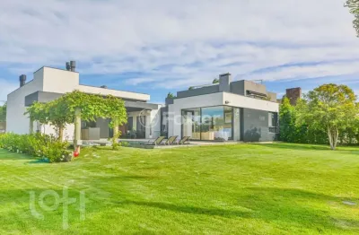 Casa em condomínio fechado com 4 quartos à venda na avenida juca batista, 8000, belém novo, porto alegre, 418 m2 por r$ 3.590.000