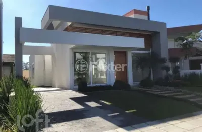 Casa em condomínio fechado com 3 quartos à venda na avenida central, 2000, zona nova, capão da canoa, 180 m2 por r$ 1.550.000