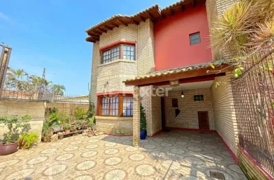 Casa com 3 quartos à venda na rua jacundá, 641, guarujá, porto alegre, 155 m2 por r$ 595.000