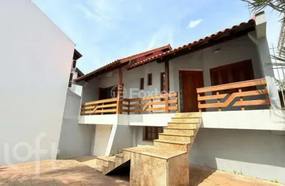 Casa com 3 quartos à venda na avenida doutor petrônio portella, 75, parque santa fé, porto alegre, 180 m2 por r$ 550.000