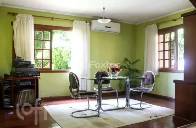Casa com 4 quartos à venda na rua lola de oliveira, 95, parque santa fé, porto alegre, 298 m2 por r$ 1.795.500