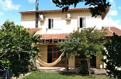 Casa com 4 quartos à venda na rua coronel camisão, 123, harmonia, canoas, 130 m2 por r$ 750.000