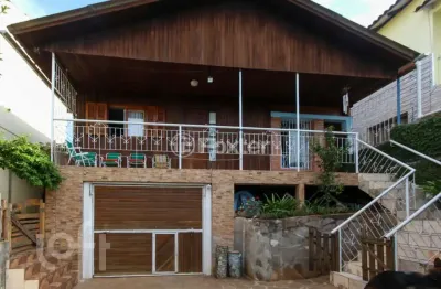 Casa com 4 quartos à venda na avenida doutor sezefredo azambuja vieira, 5729, olaria, canoas, 300 m2 por r$ 620.000