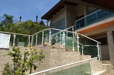 Casa com 4 quartos à venda na rua senador annibal di primio beck, 151, boa vista, porto alegre, 451 m2 por r$ 1.690.000