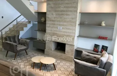 Casa em condomínio fechado com 4 quartos à venda na avenida central, 31, zona nova, capão da canoa, 300 m2 por r$ 2.100.000