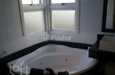 Casa em condomínio fechado com 3 quartos à venda na rua guatambu, 833, hípica, porto alegre, 256 m2 por r$ 800.000