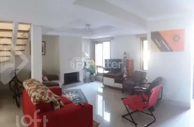 Casa em condomínio fechado com 3 quartos à venda na rua carlos maximiliano fayet, 210, hípica, porto alegre, 148 m2 por r$ 590.000