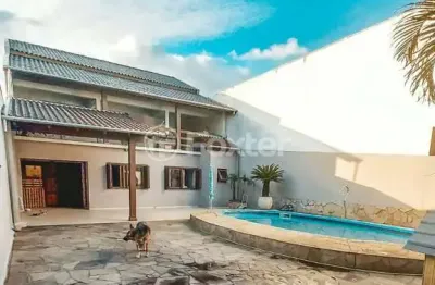 Casa com 4 quartos à venda na rua nicolau seibel, 529, rio branco, canoas, 295 m2 por r$ 650.000